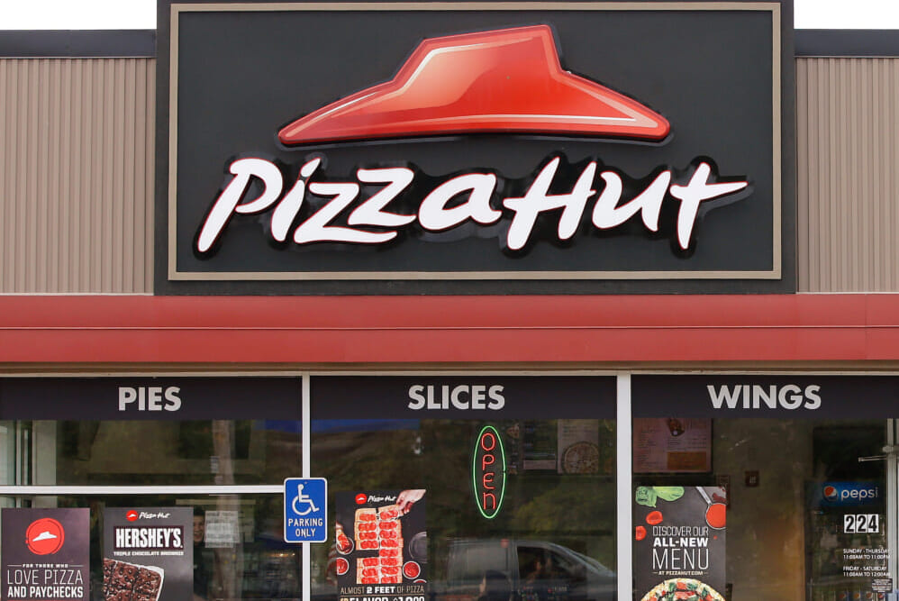 Pizza Hut’s parent company says it’s considering selling the chain