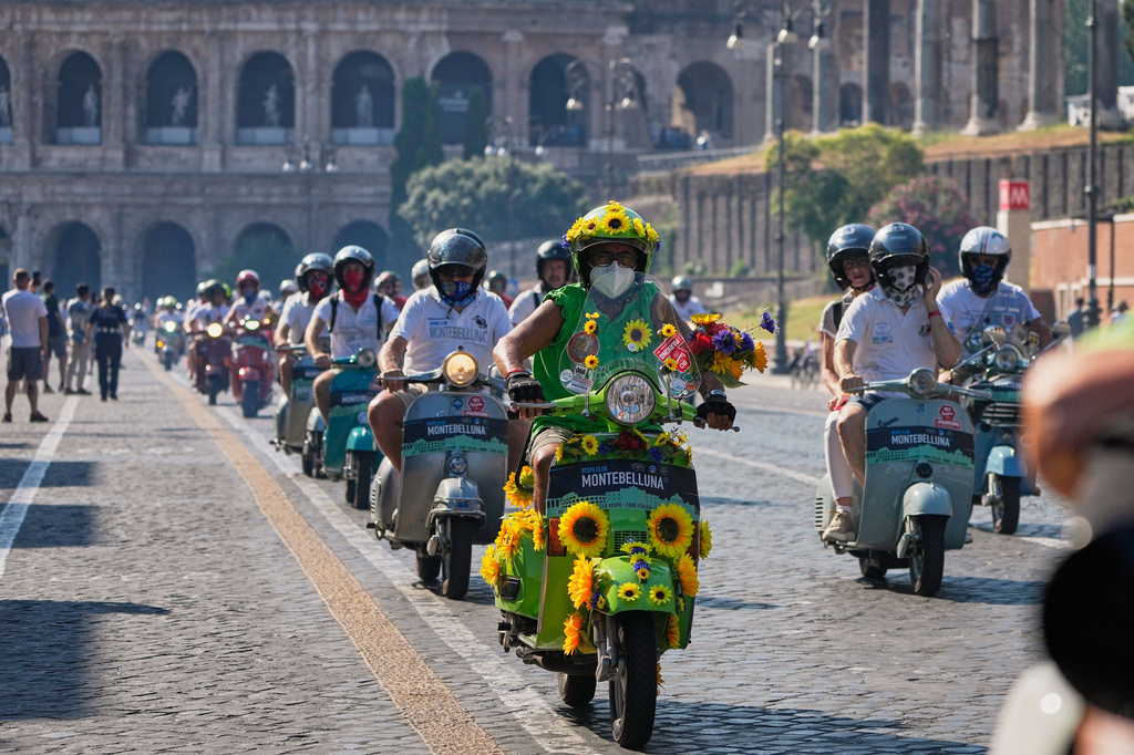 Thousands of Vespas fill Rome for the scooter’s 80th birthday